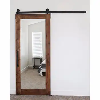 Wooden interior barn style door for closet with mirror