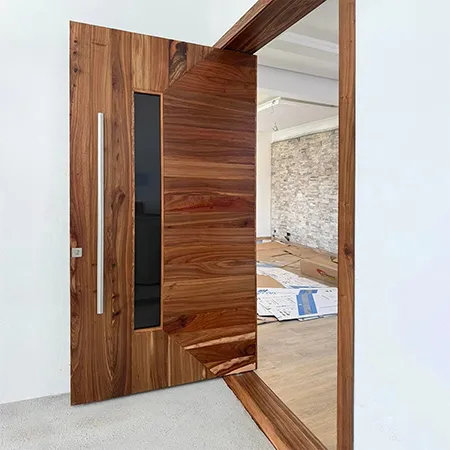 Residential exterior Solid walnut wood pivot front door with glass